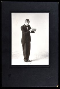 Young Magician Performing a Card Trick