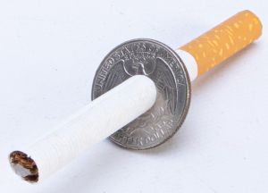 Cigarette Thru Quarter